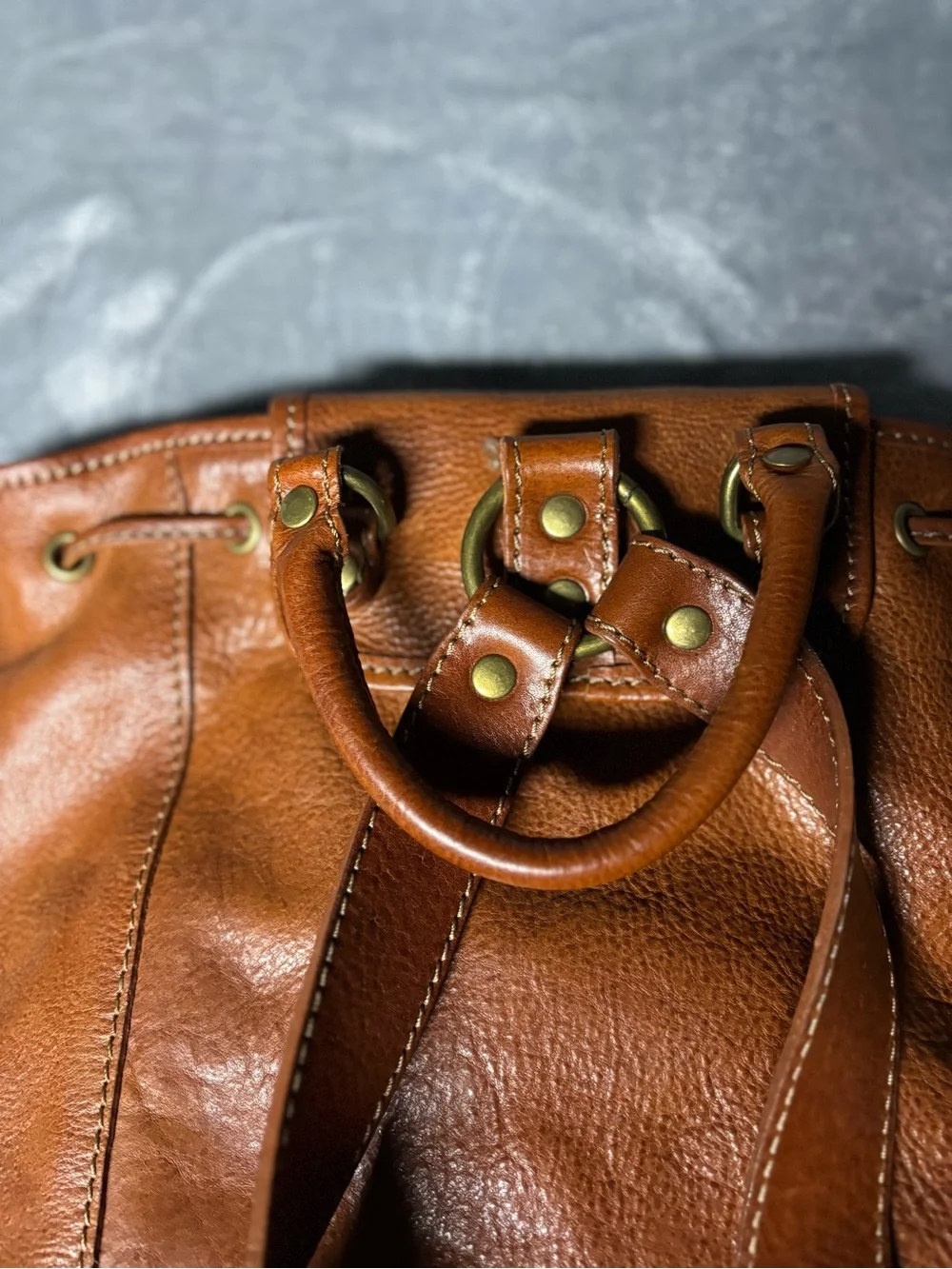 Vera Pelle Tan Leather Drawstring Backpack with Front Buckle Pocket